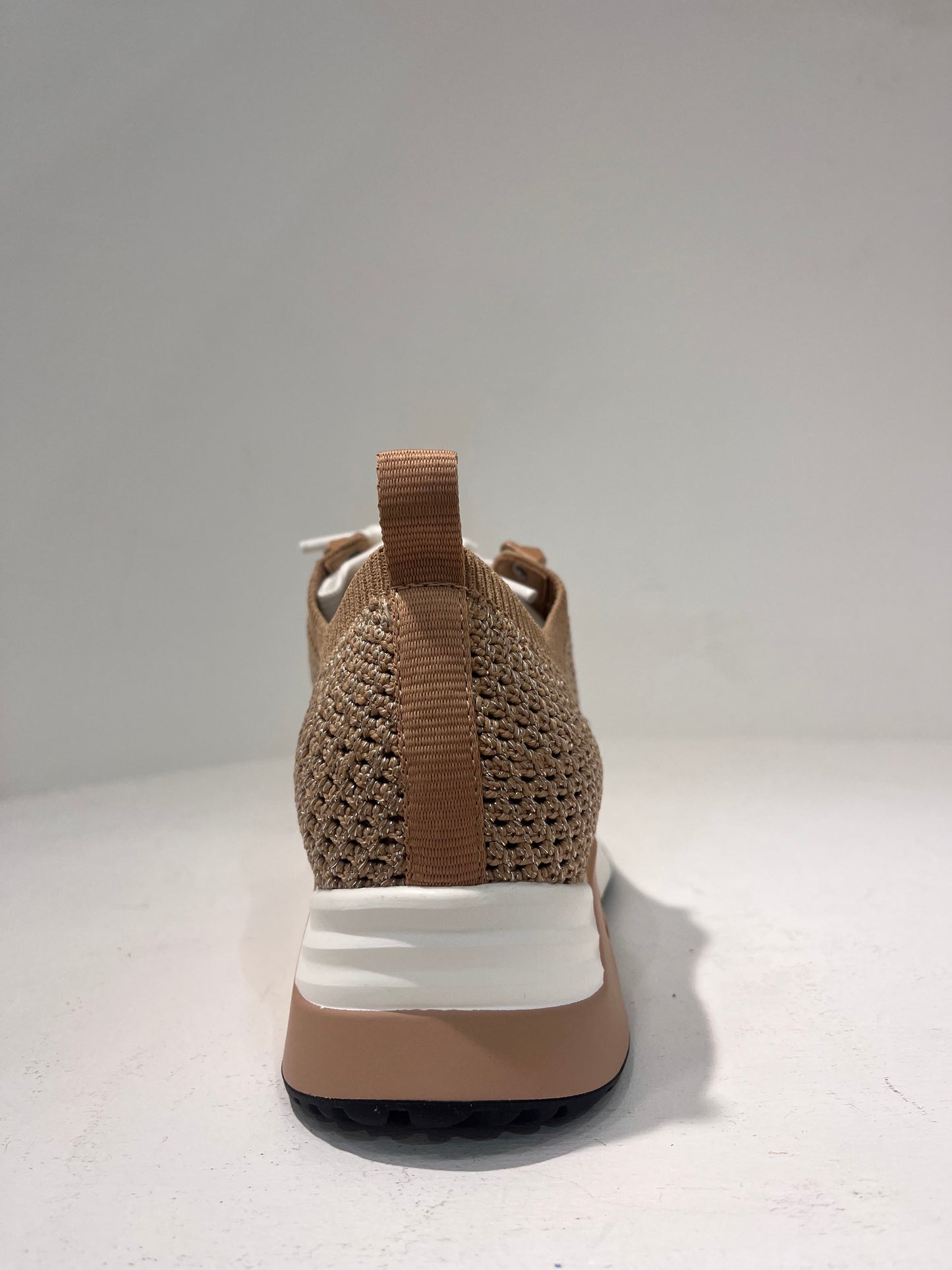 A Laika04 knitted lurex trainers