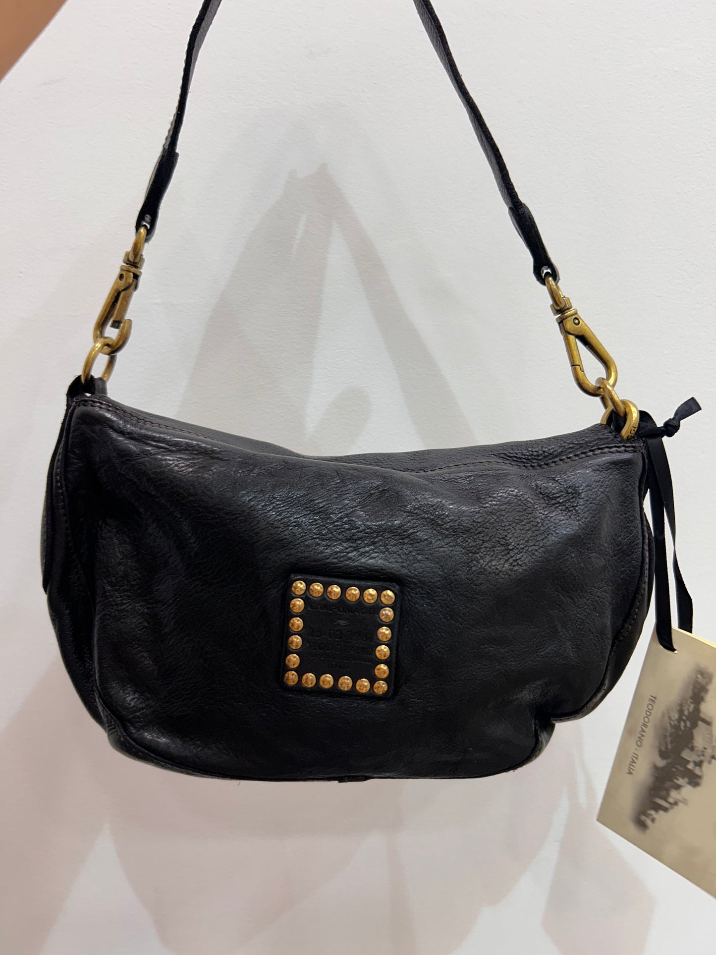 C 42490 Brass knot, pannelled small satchel