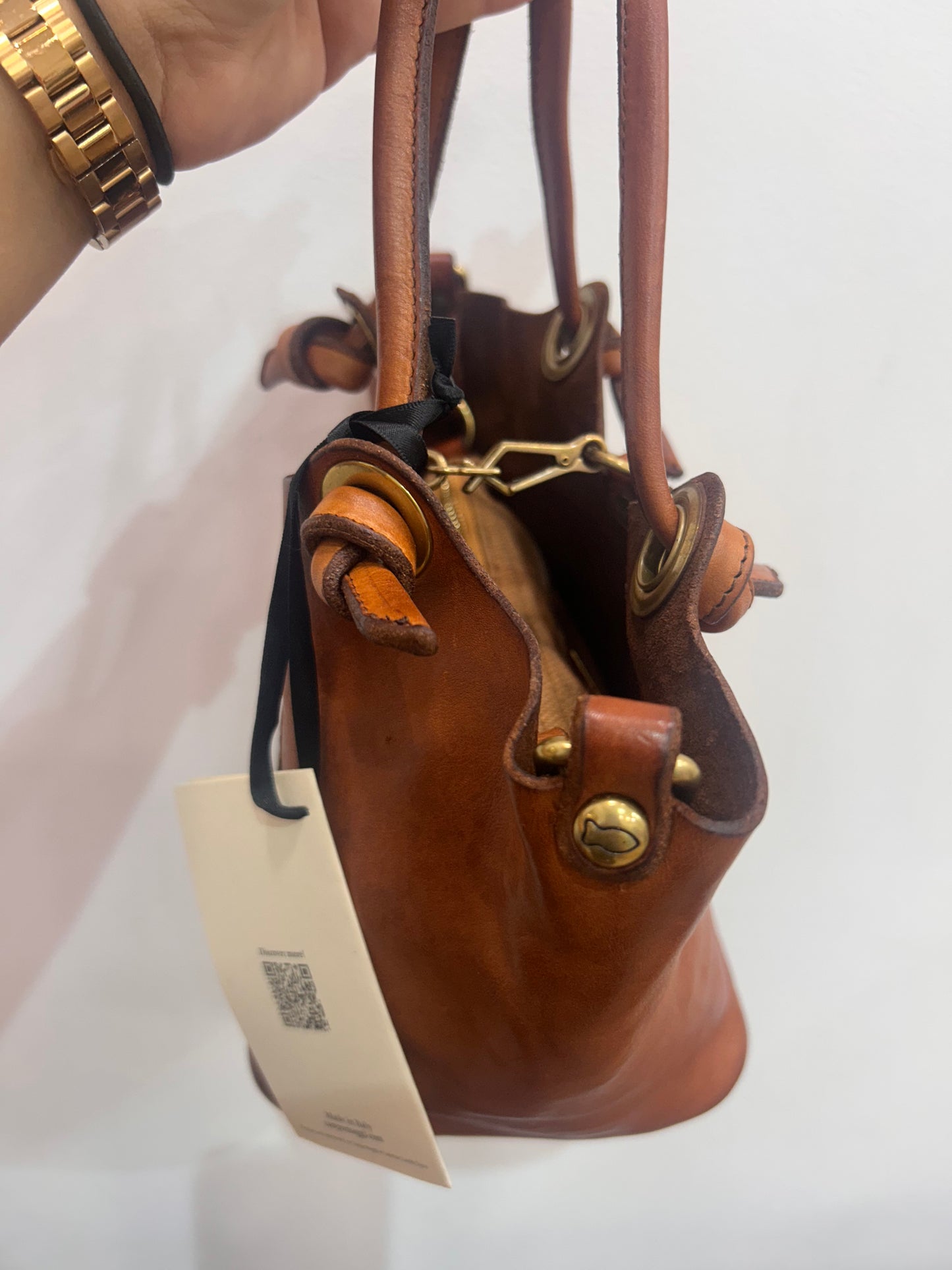 C 41060 Panelled knot strap small bucket bag