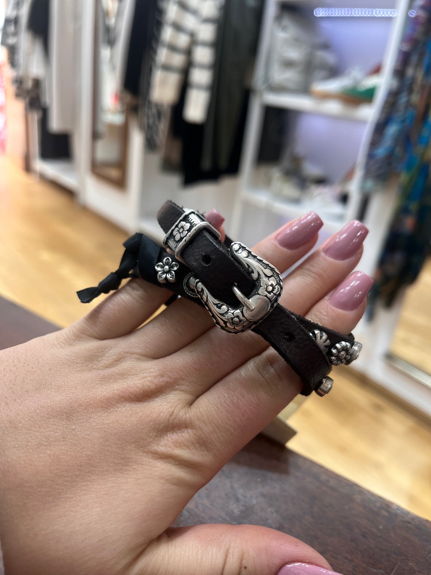 C C002270nd-brown Floral stud bracelet with buckle.