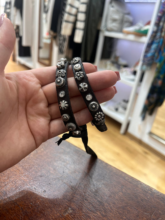 C C002270nd-brown Floral stud bracelet with buckle.