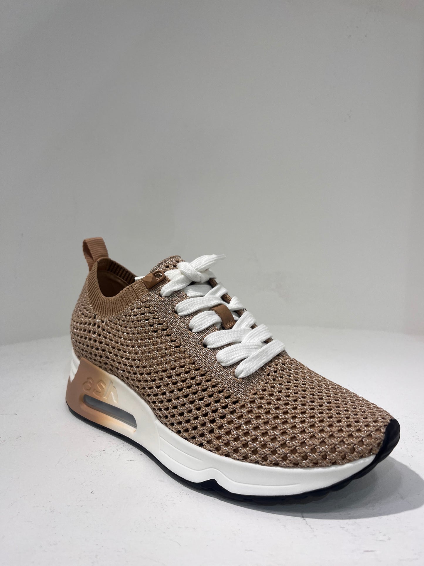 A Laika04 knitted lurex trainers