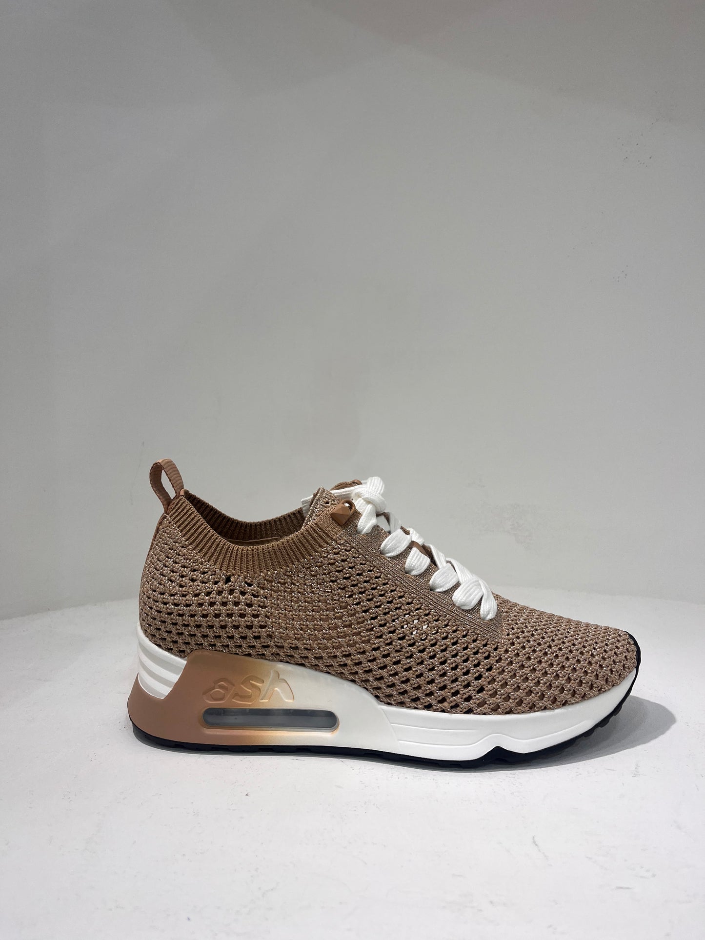 A Laika04 knitted lurex trainers