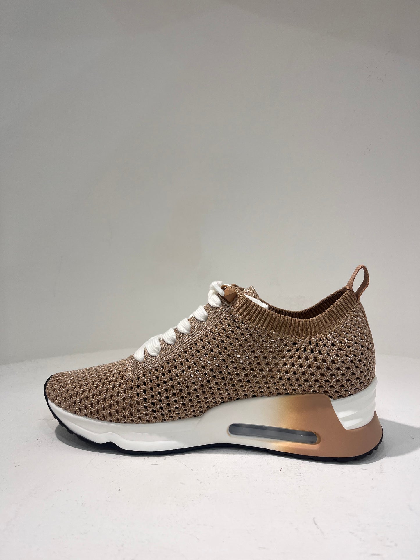 A Laika04 knitted lurex trainers