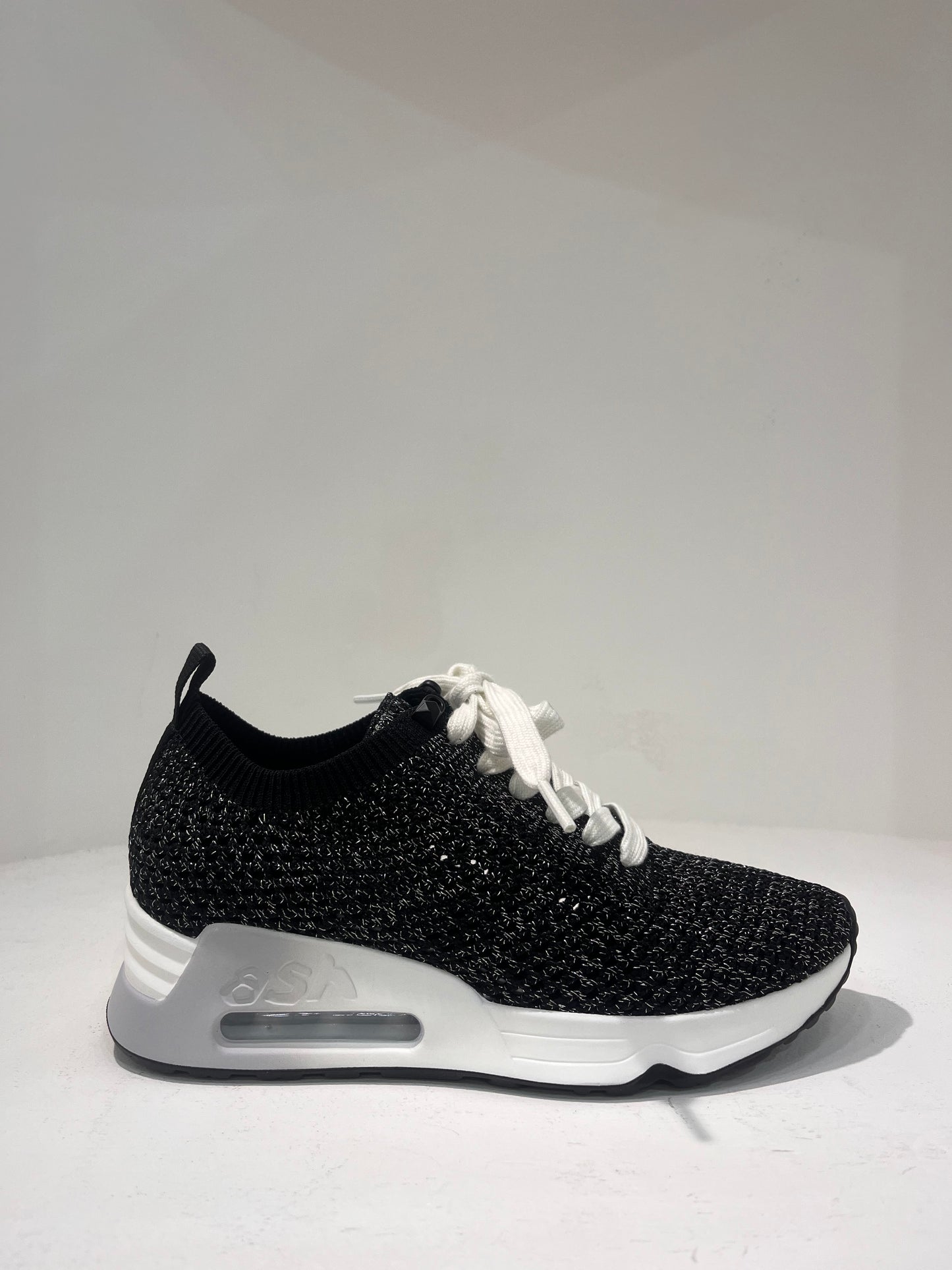 A Laika06 knitted lurex trainers