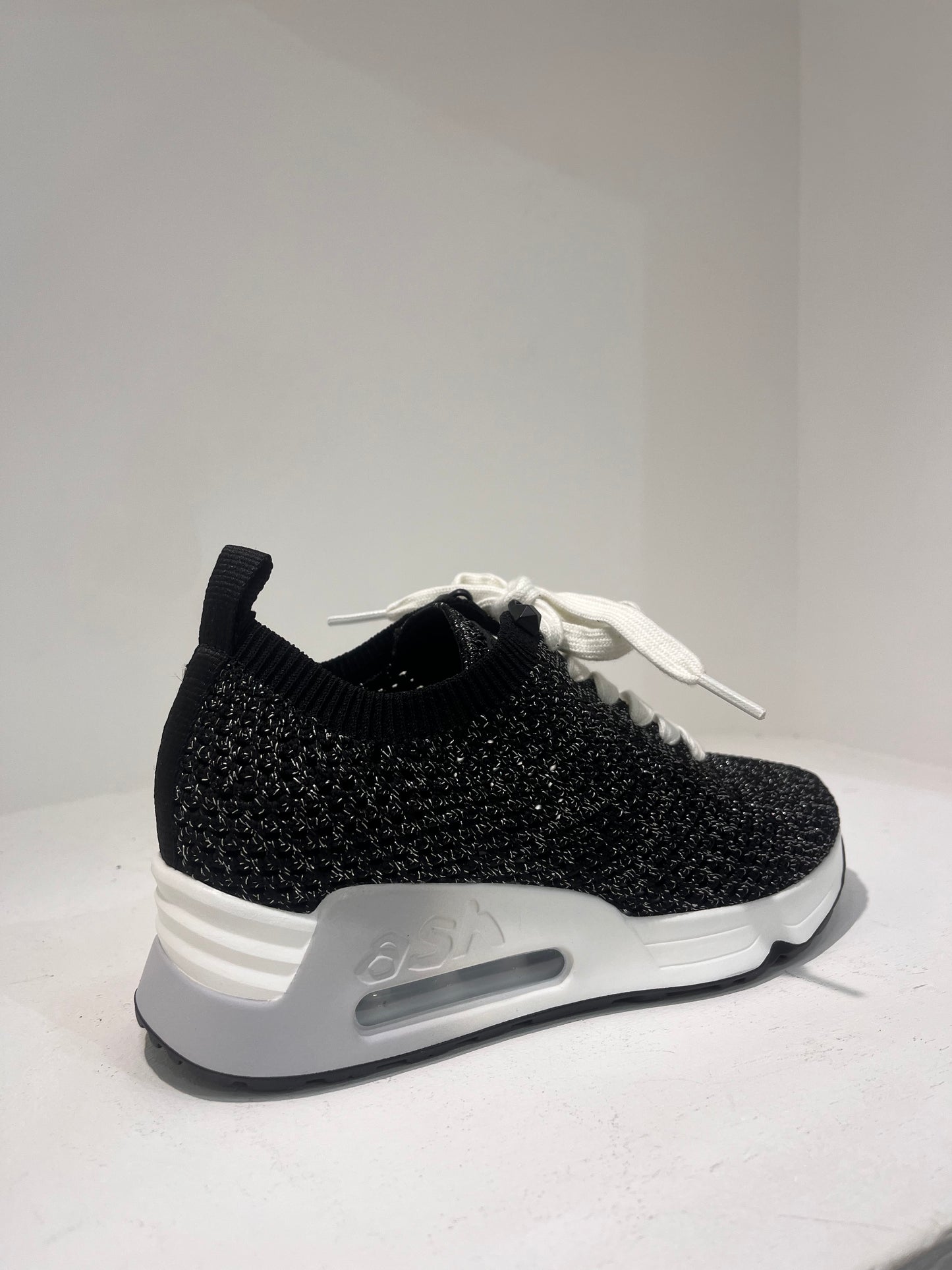 A Laika06 knitted lurex trainers