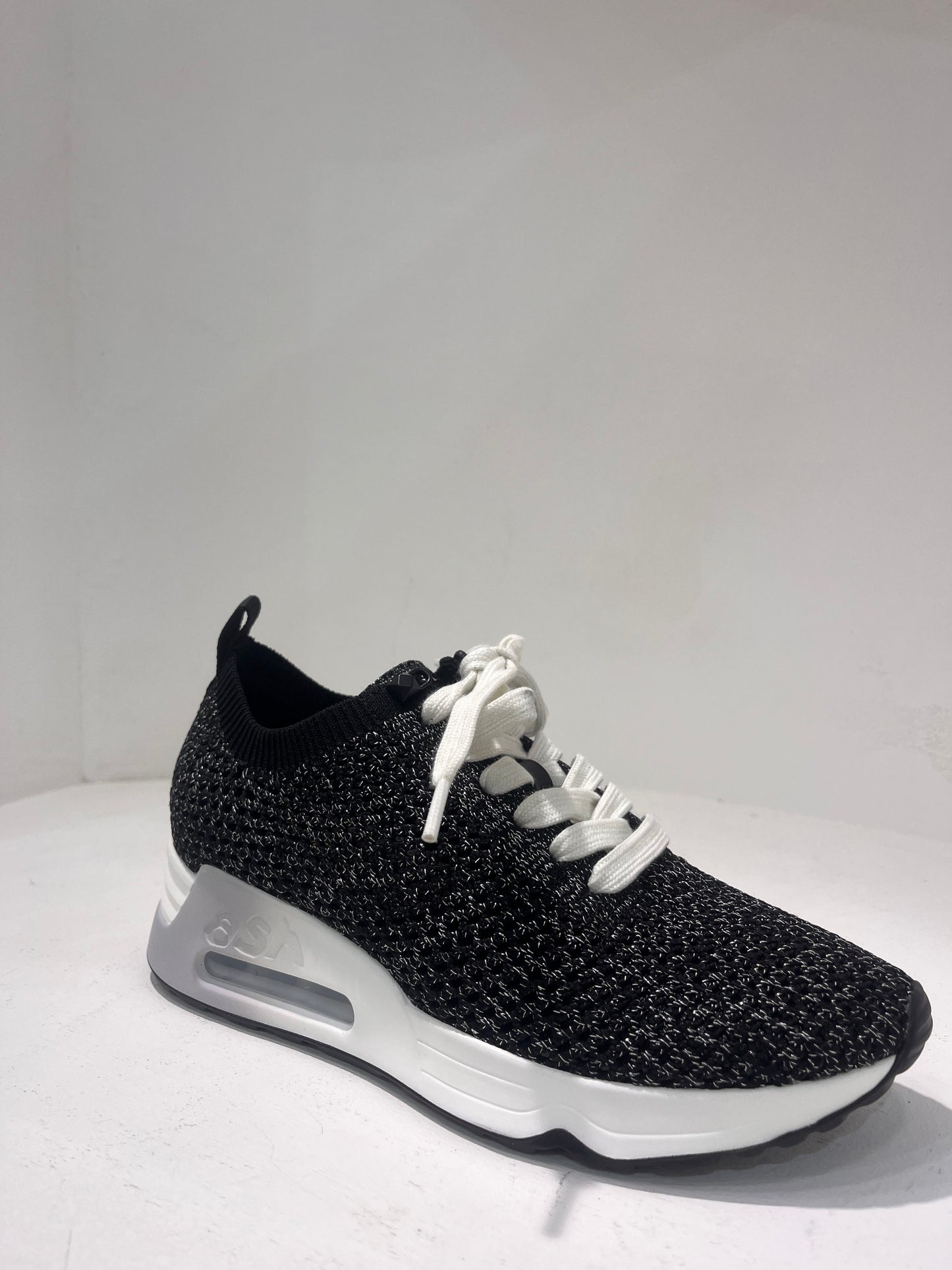 A Laika06 knitted lurex trainers
