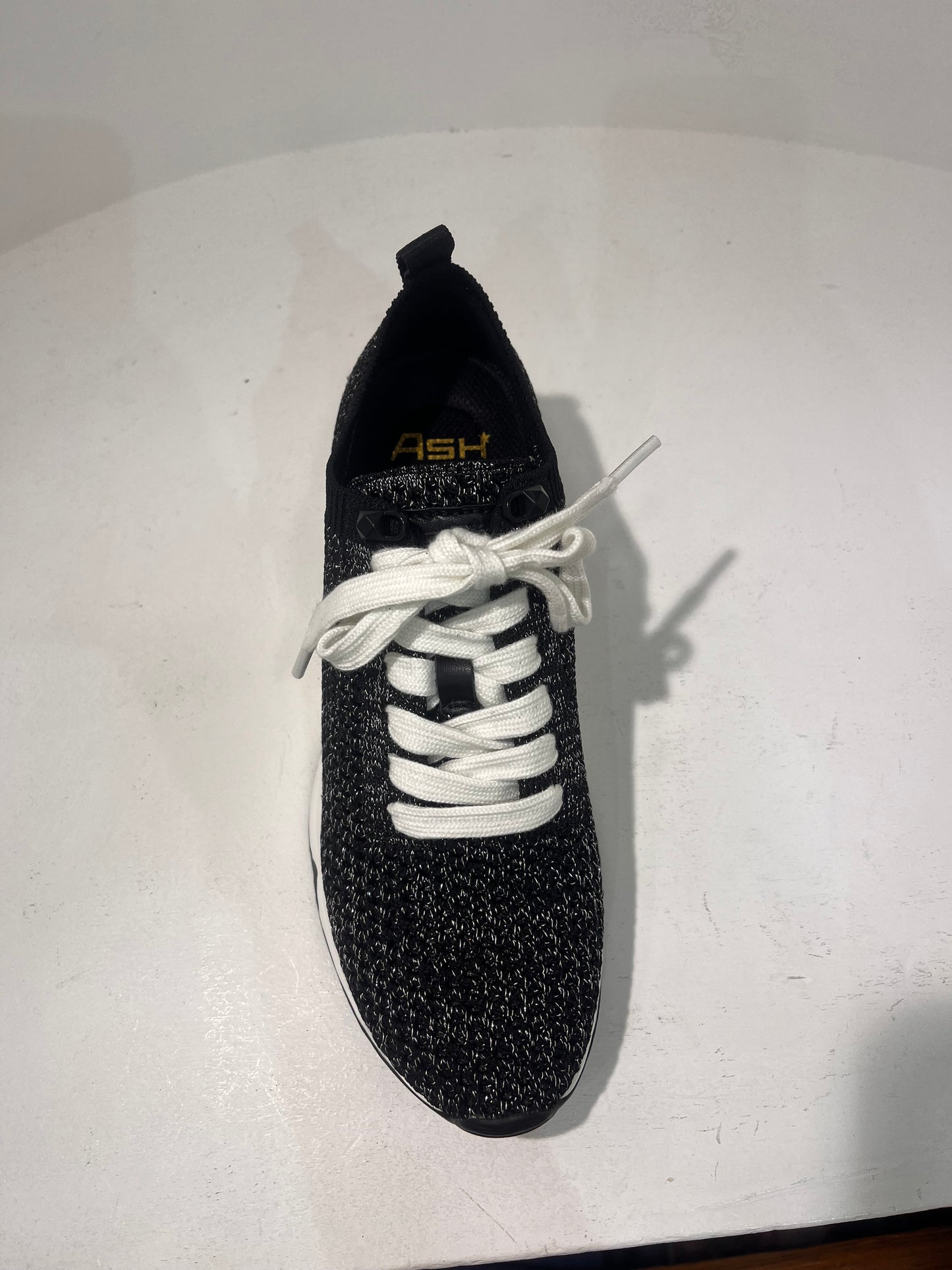A Laika06 knitted lurex trainers