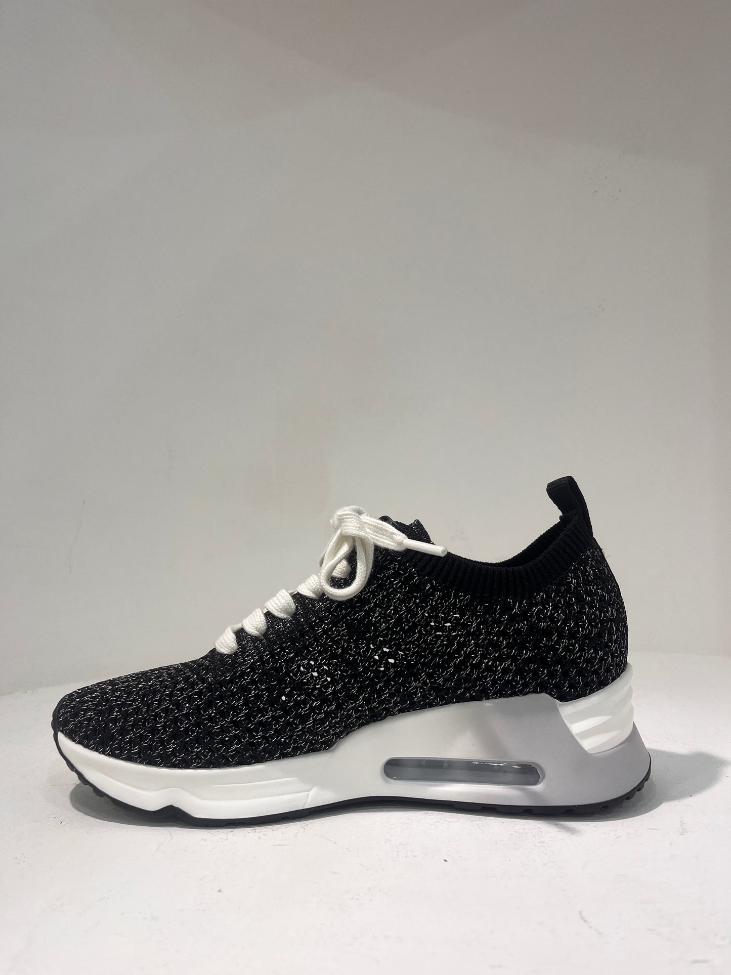 A Laika06 knitted lurex trainers