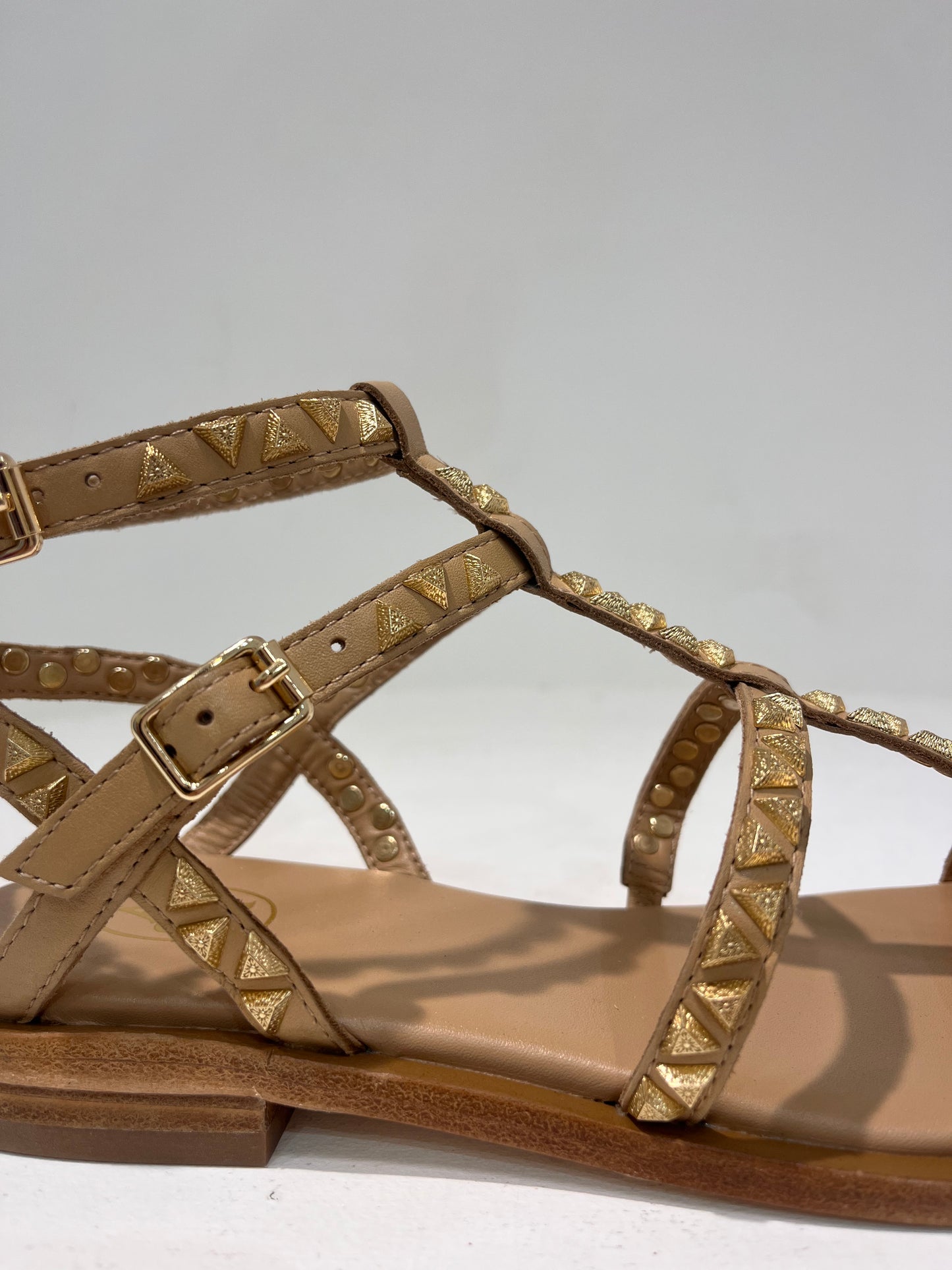 A Pandora02 gold triangle stud gladiator sandals