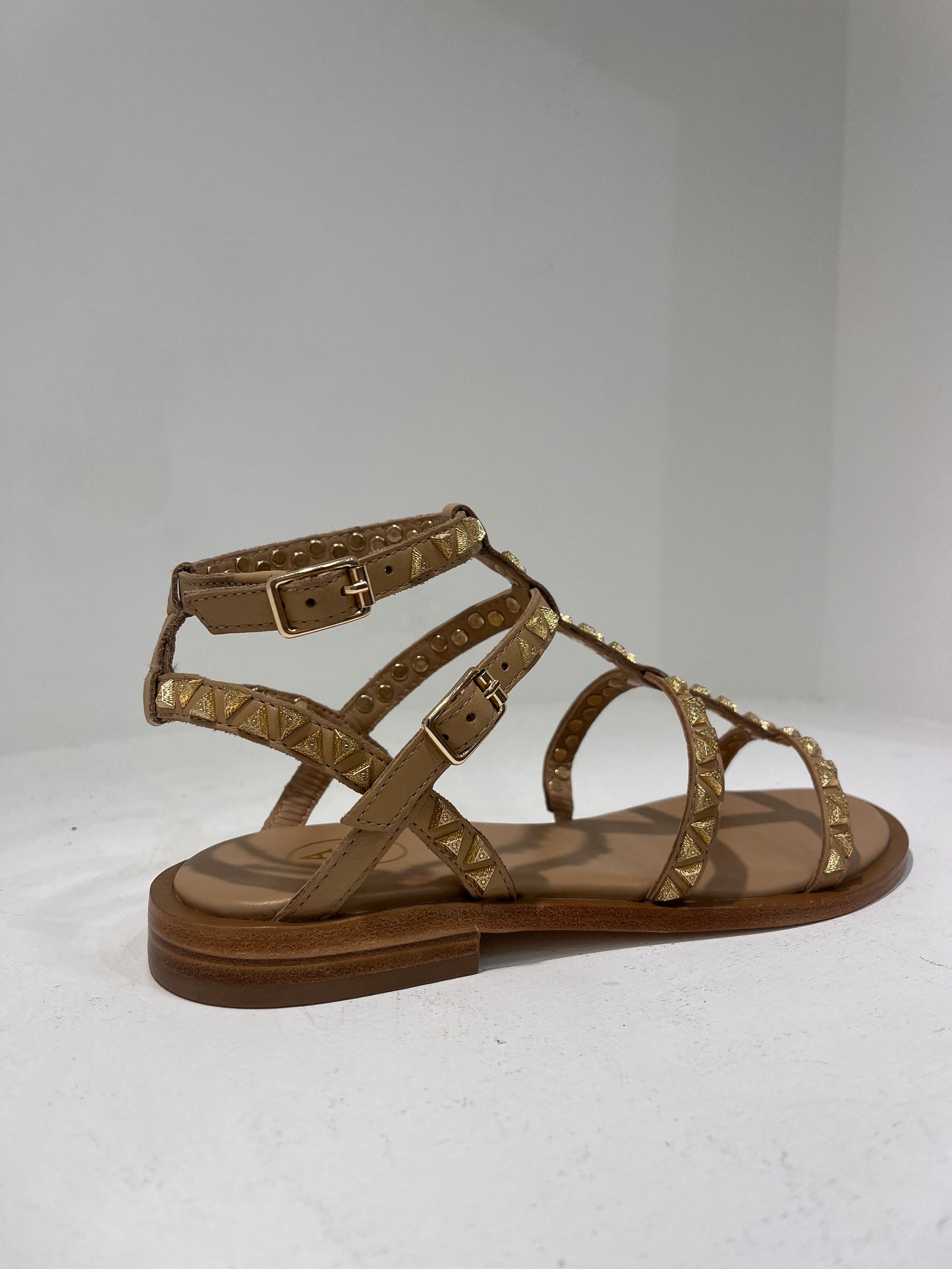 A Pandora02 gold triangle stud gladiator sandals