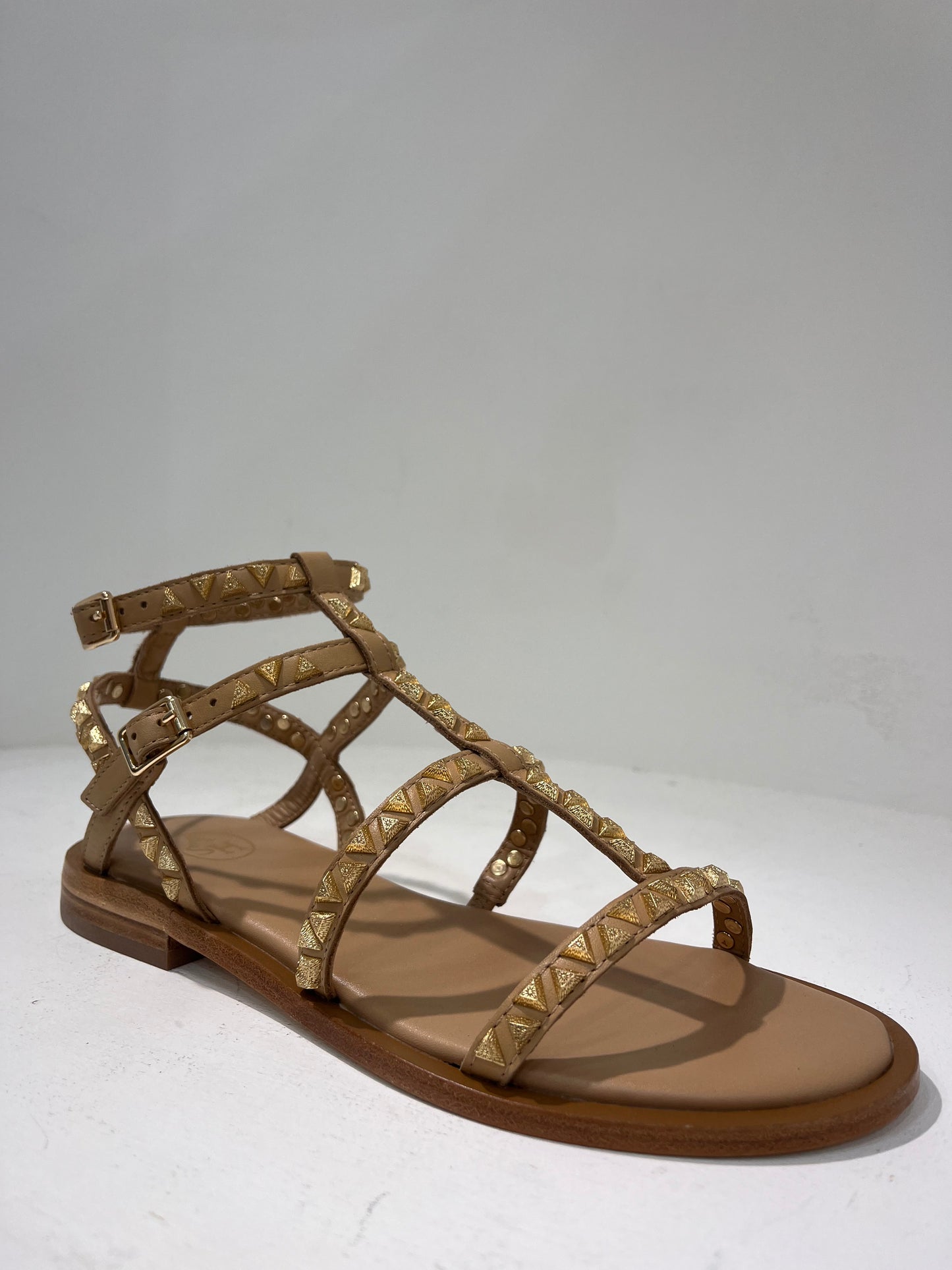 A Pandora02 gold triangle stud gladiator sandals